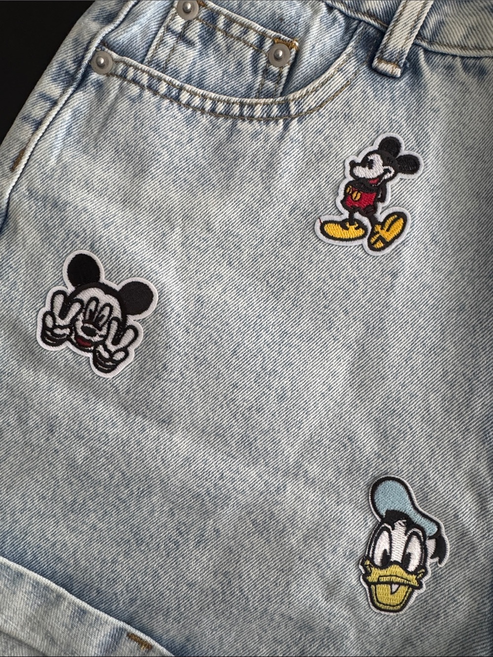 Light Wash Denim Women’s Shorts with Mickey & Friends Patches - Picture 2 of 5